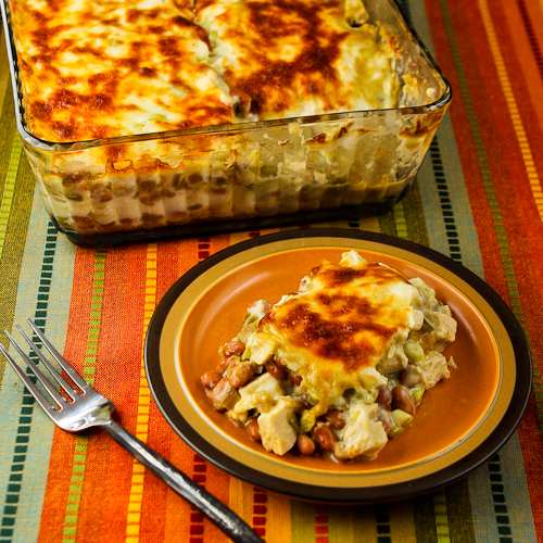 Low Carb Layered Mexican Casserole Recipe with Chicken, Green Chiles, Pinto Beans, and Cheese